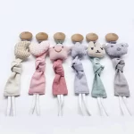 attache tetine tissu